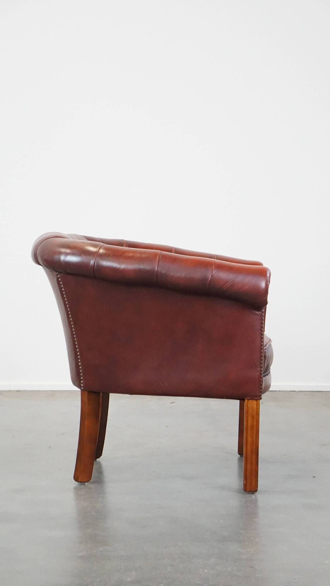 Red cow leather English chesterfield club chair
