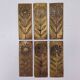Six cleanliness plaques, flower design, brass.
