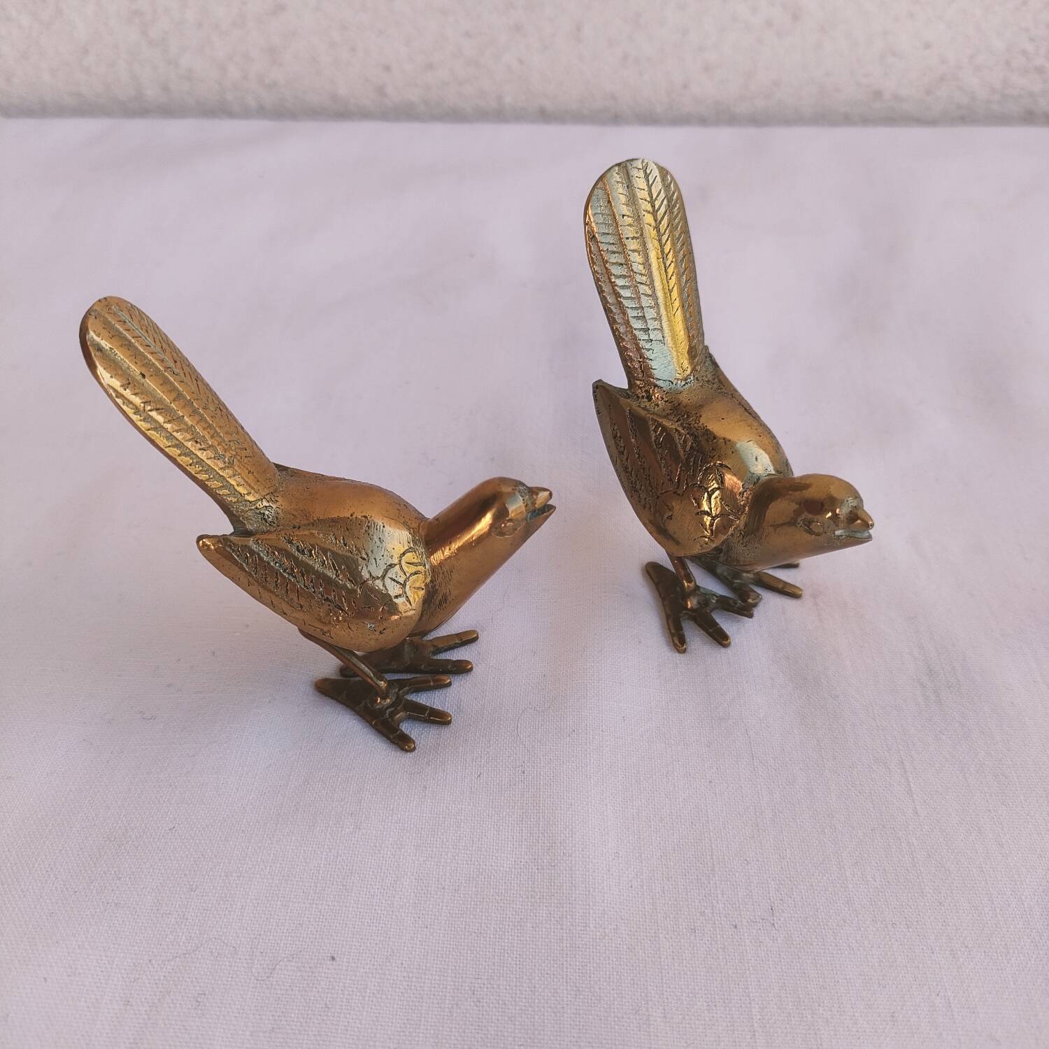 Pair of small brass birds