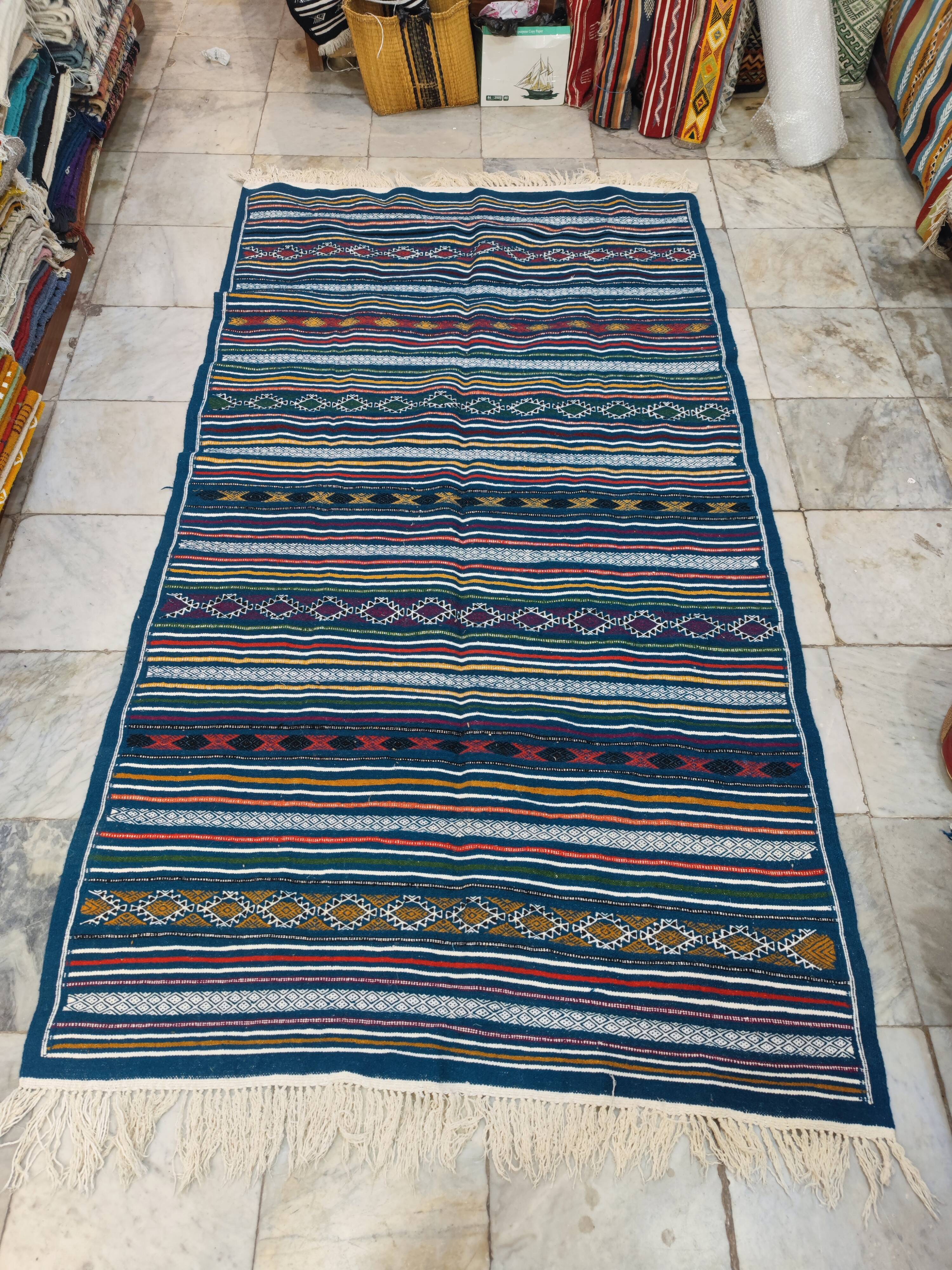 Handwoven blue kilim rug in natural wool