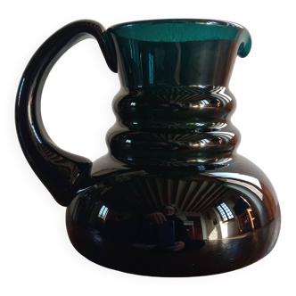 Deep green jug or pitcher with modern design - thick glass