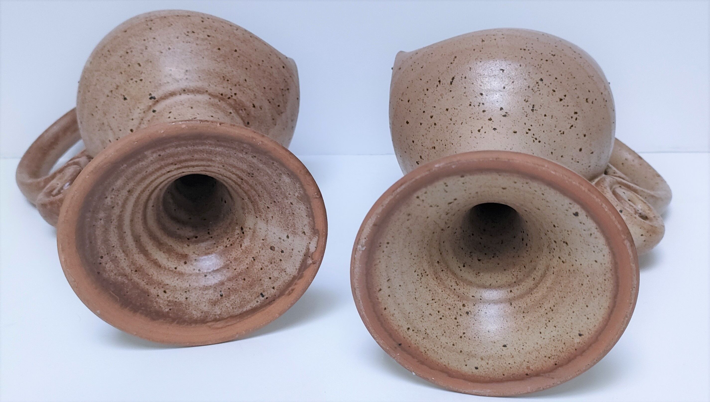 Pair of vintage “heart” sandstone candlesticks