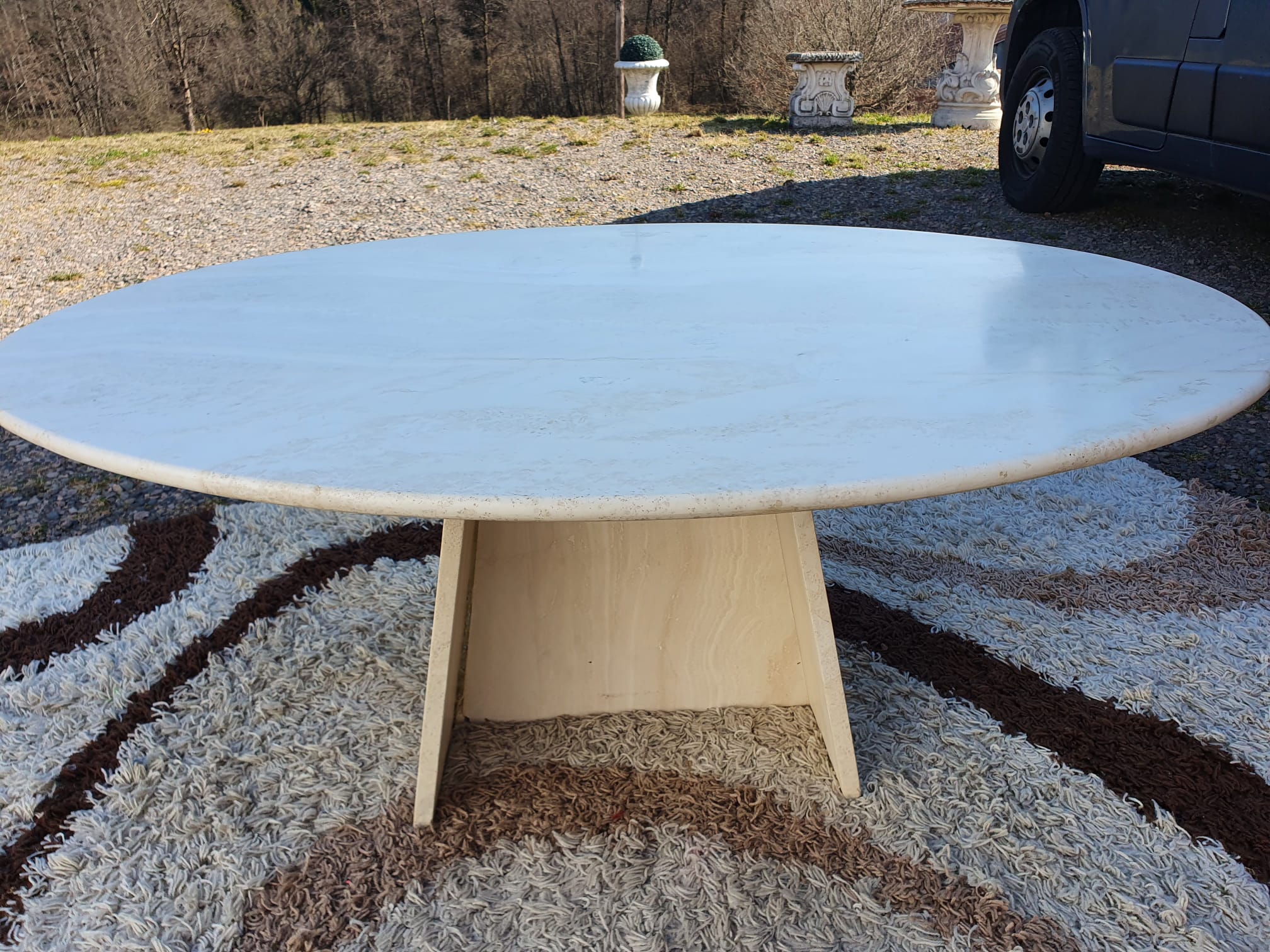Oval travertine coffee table