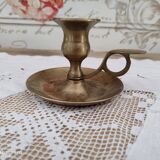 Hand candle holder called cellar rat in solid brass
