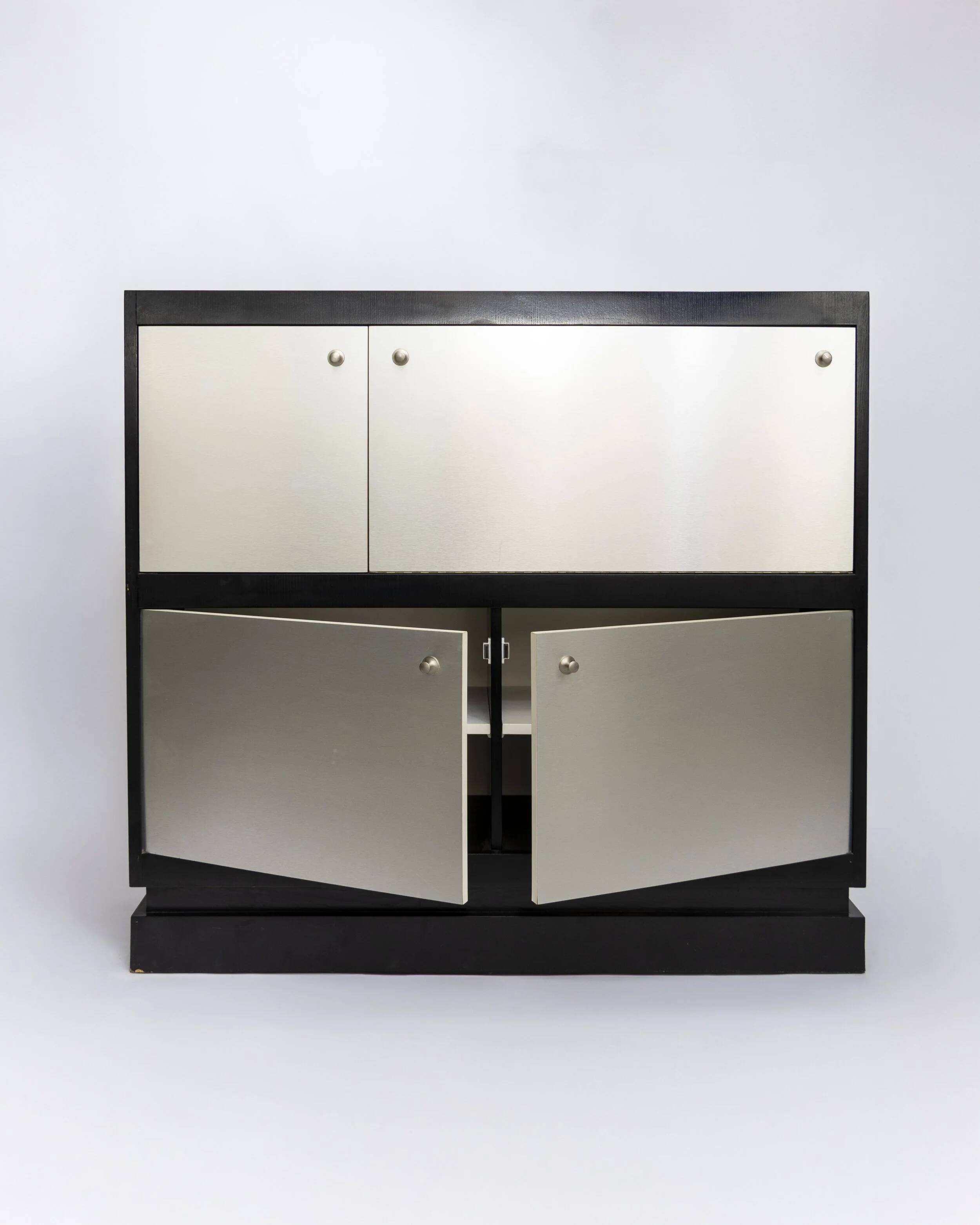 Brushed metal bar cabinet by De Coene