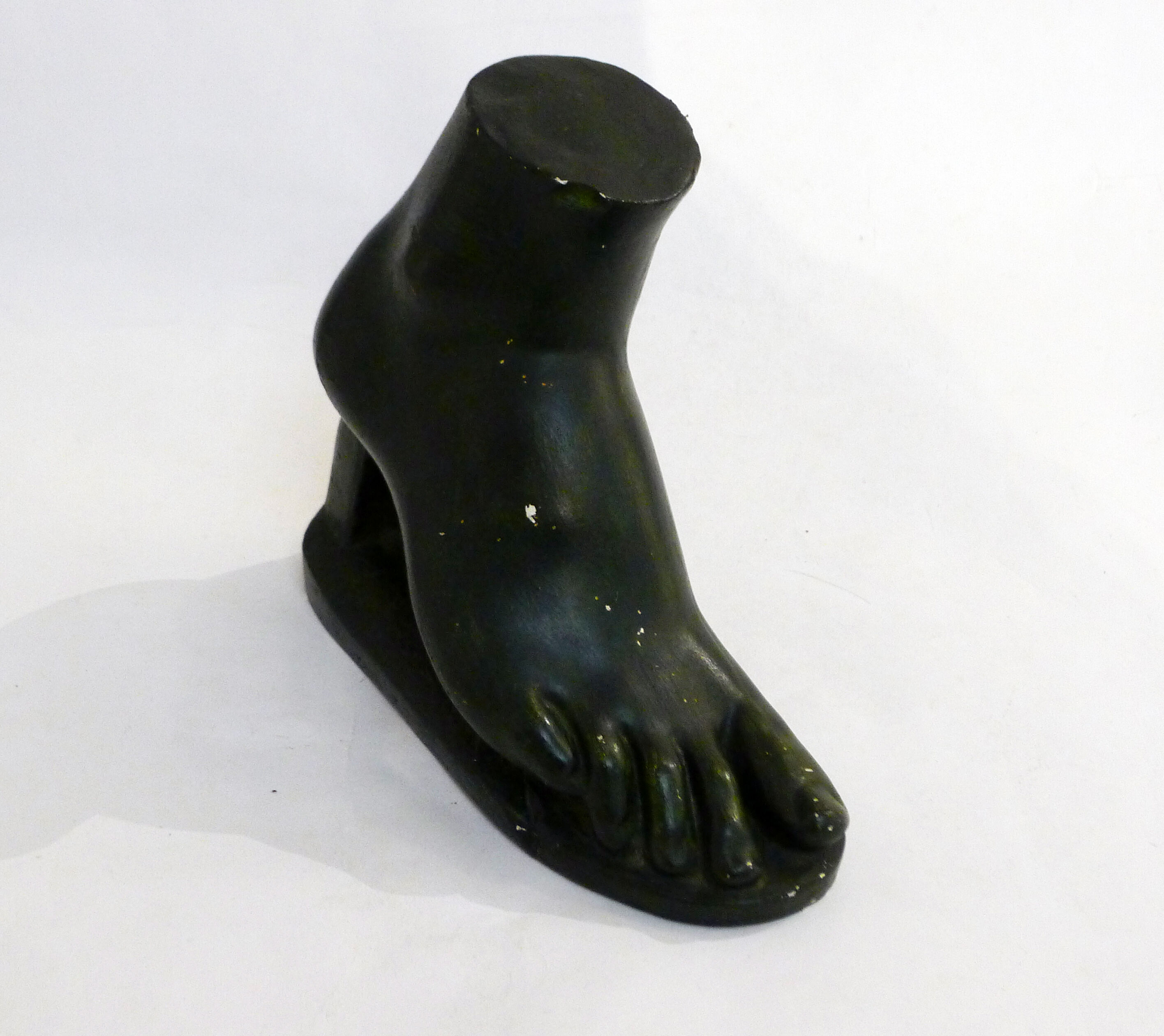 Sculpture pied en plâtre