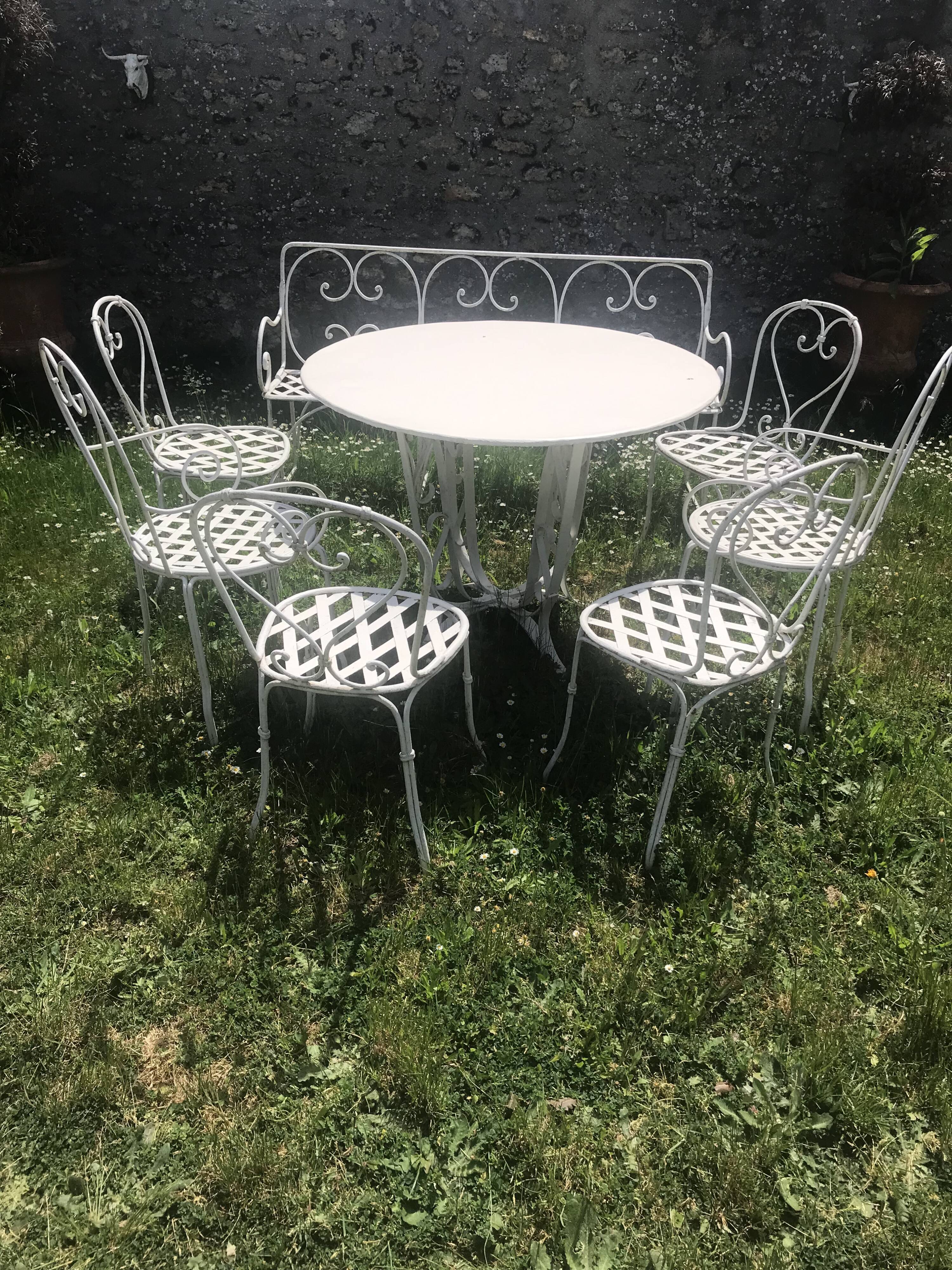 Antique wrought iron garden furniture