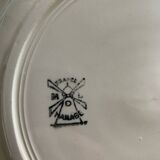 Mismatched plates in old earthenware