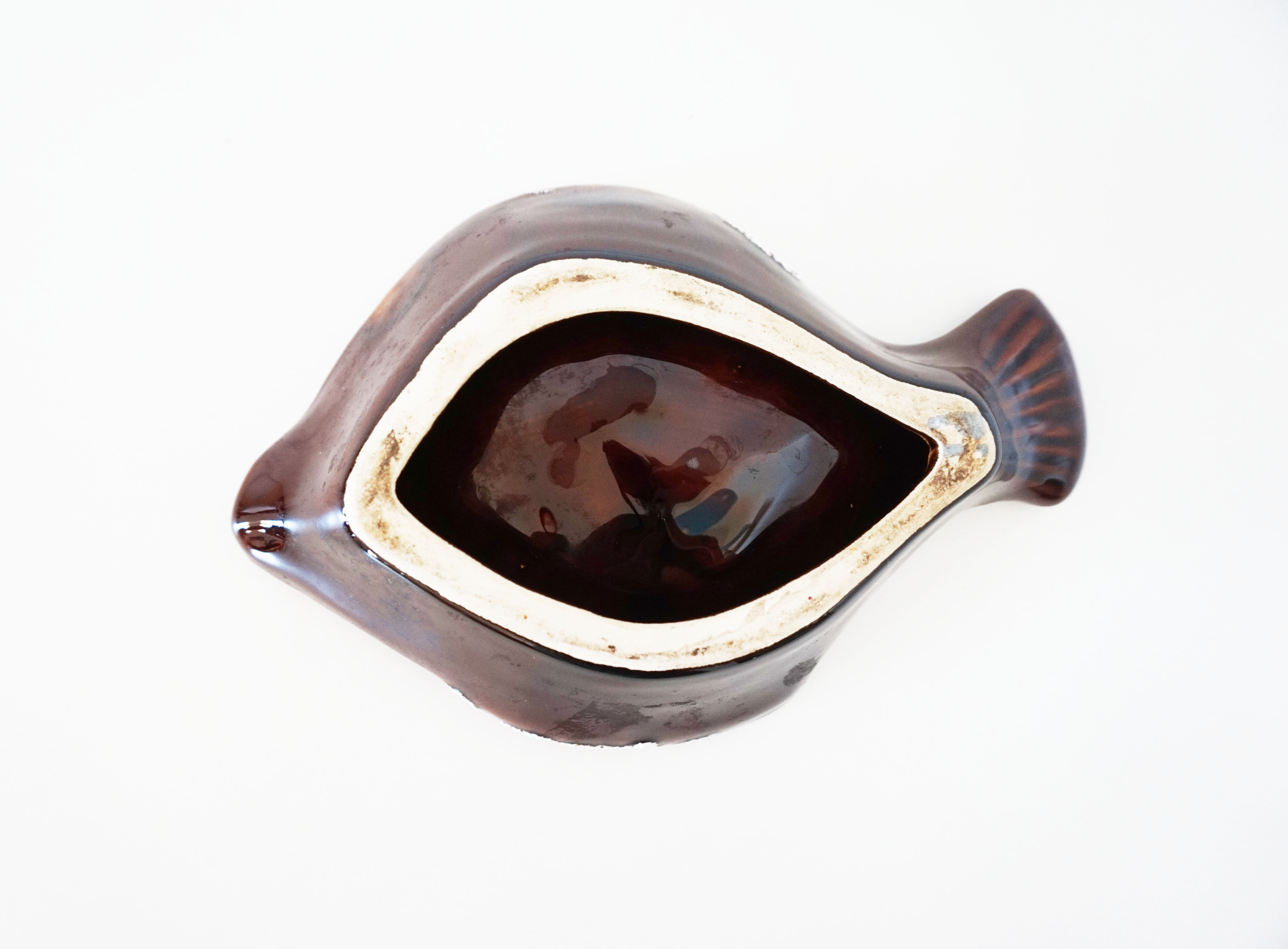 Empty pocket vintage ceramic fish