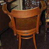 J.J. Kohn barber's chair in curved wood and spring mechanism