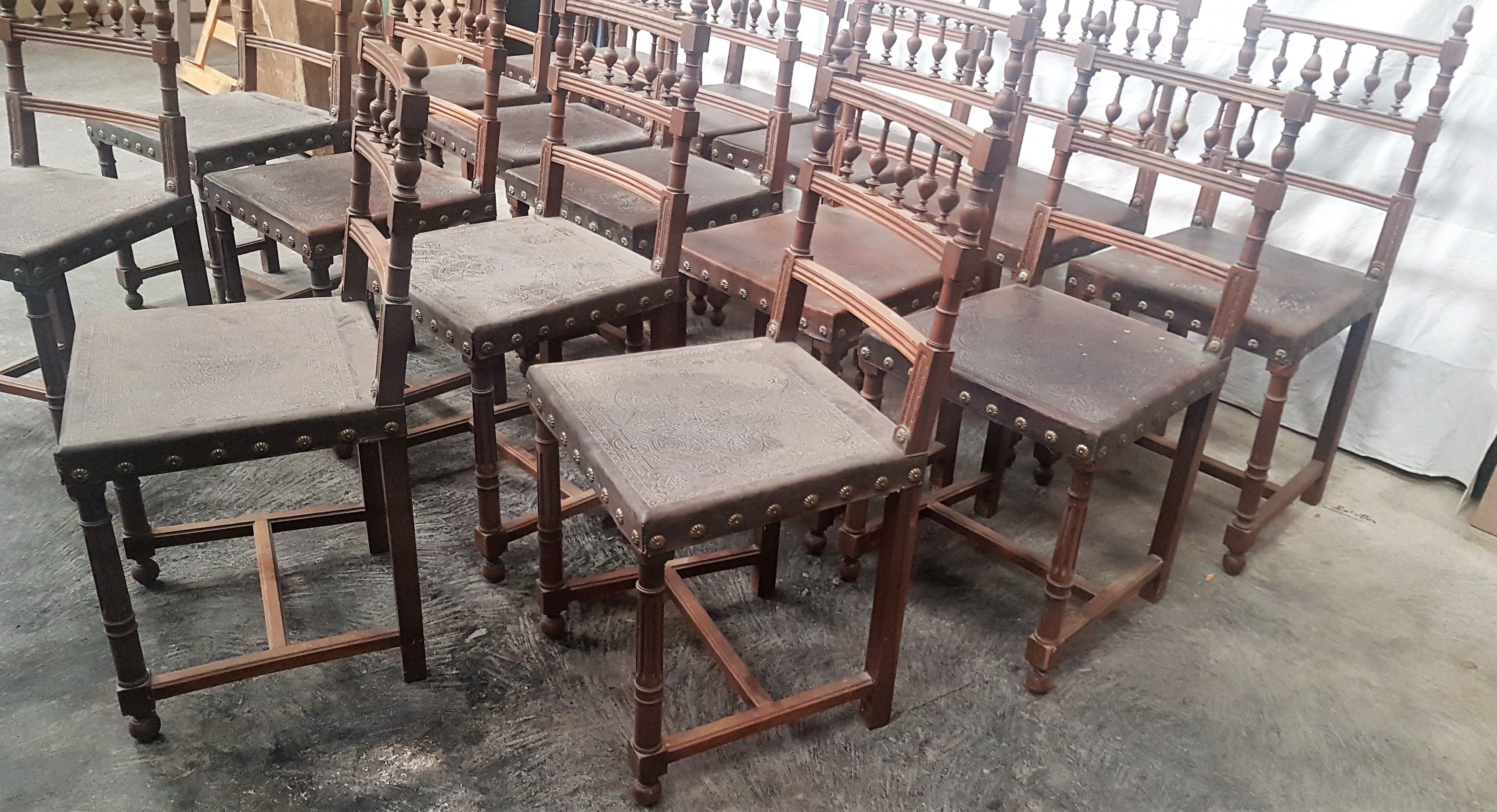 A set of 16 henri 2 style chairs in repelled leather 2 patterns