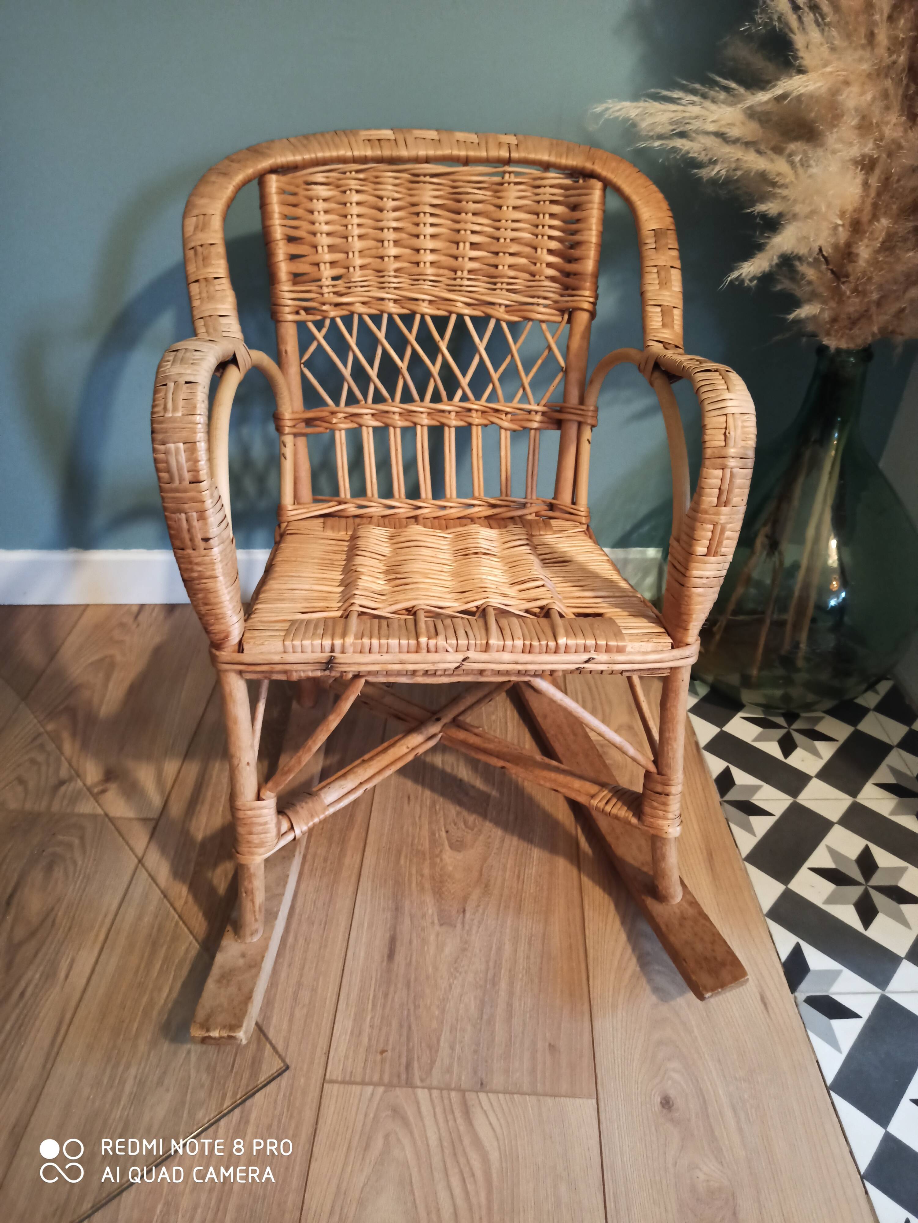 Vintage rattan children's rocking chair