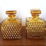 2 yellow glass whiskey carafes