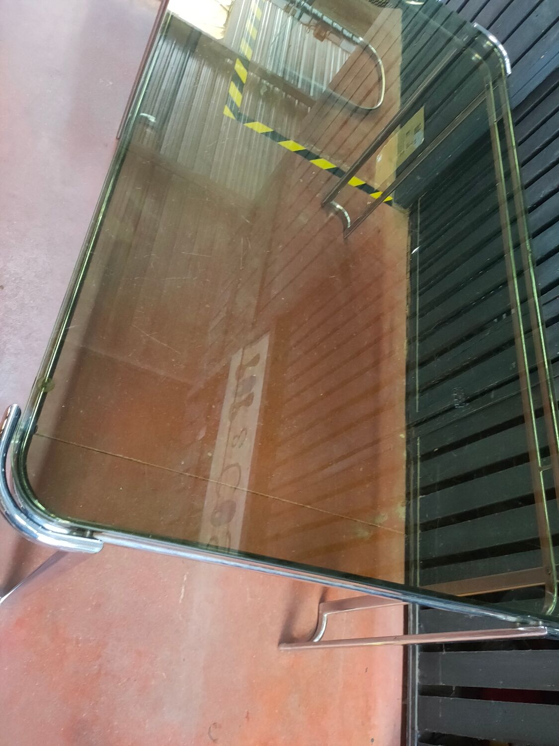 Vintage Italian table with tubular frame and smoked glass, 1970
