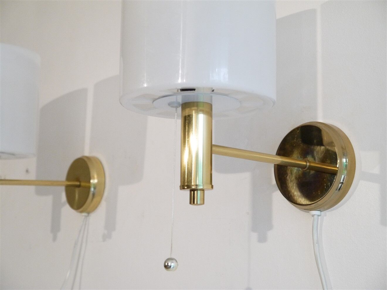 Pair of Scandinavian brass and acrylic appliques from Nafa 1970