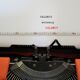 Silver Reed 200 orange metal typewriter made in Japan 70s