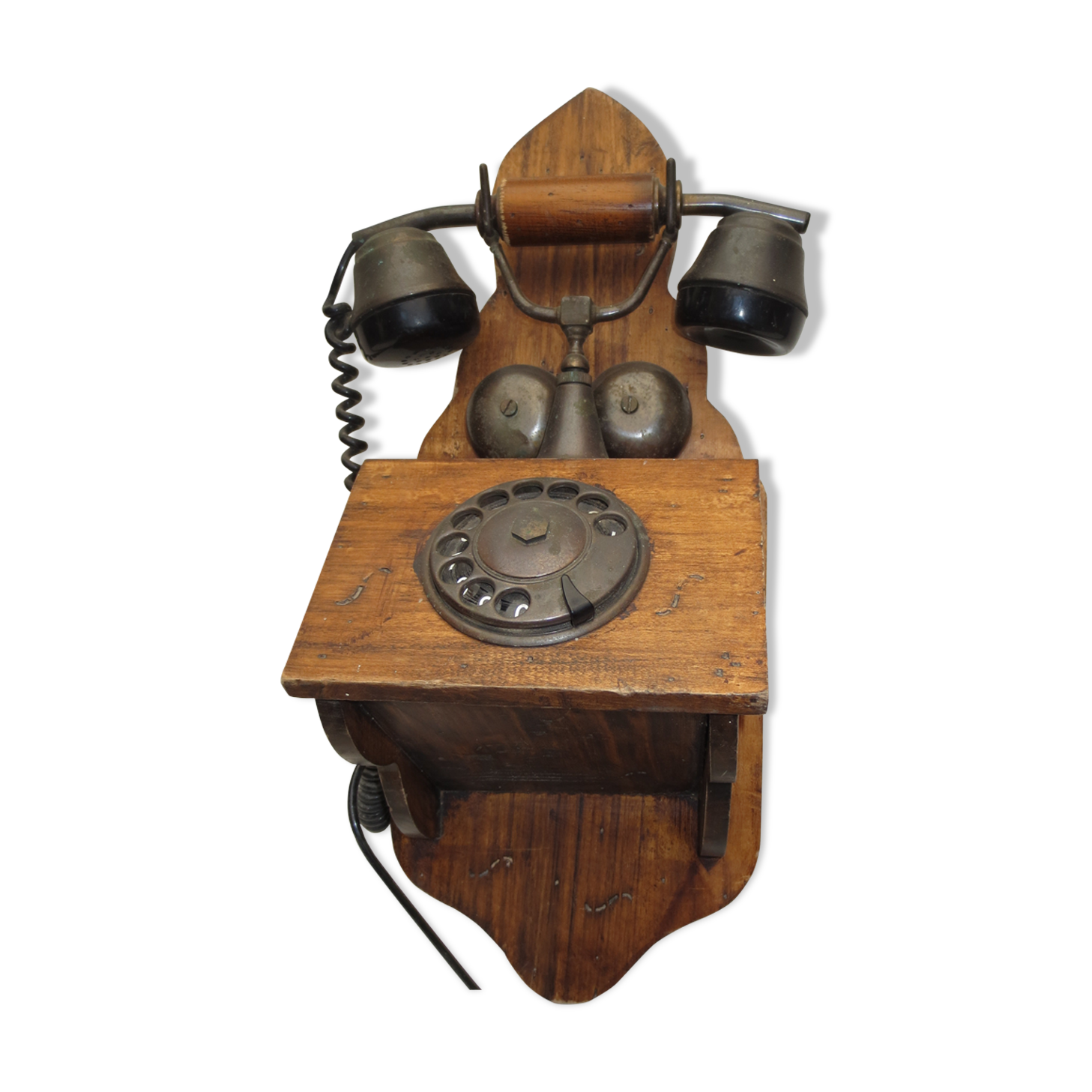 Old wood and metal wall phone