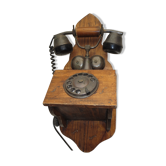 Old wood and metal wall phone