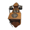 Old wood and metal wall phone
