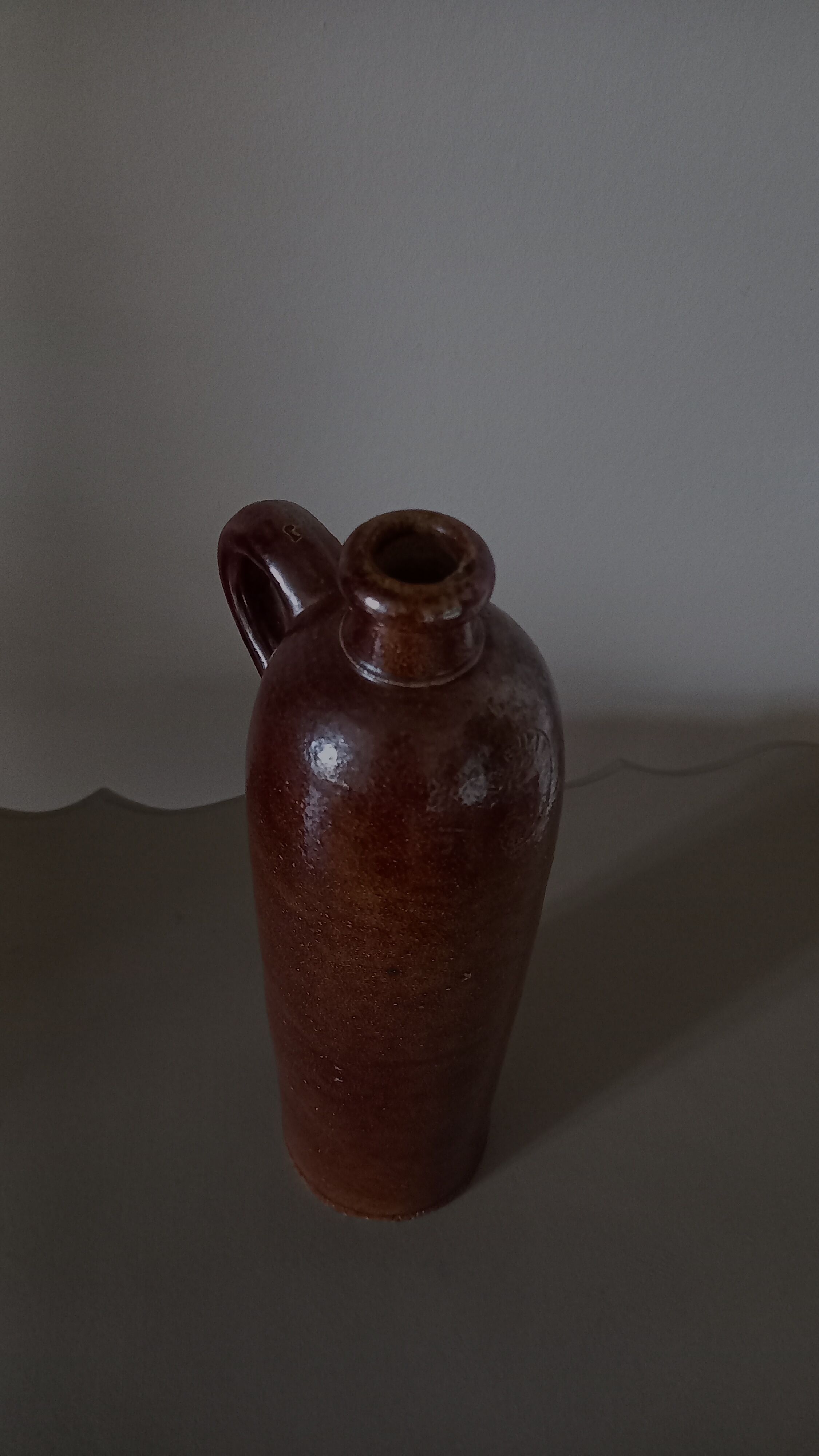 Brown glazed stoneware bottle Amsterdamsche, nineteenth century
