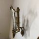Wall lamp in Louis XV style in brass, shell decoration.