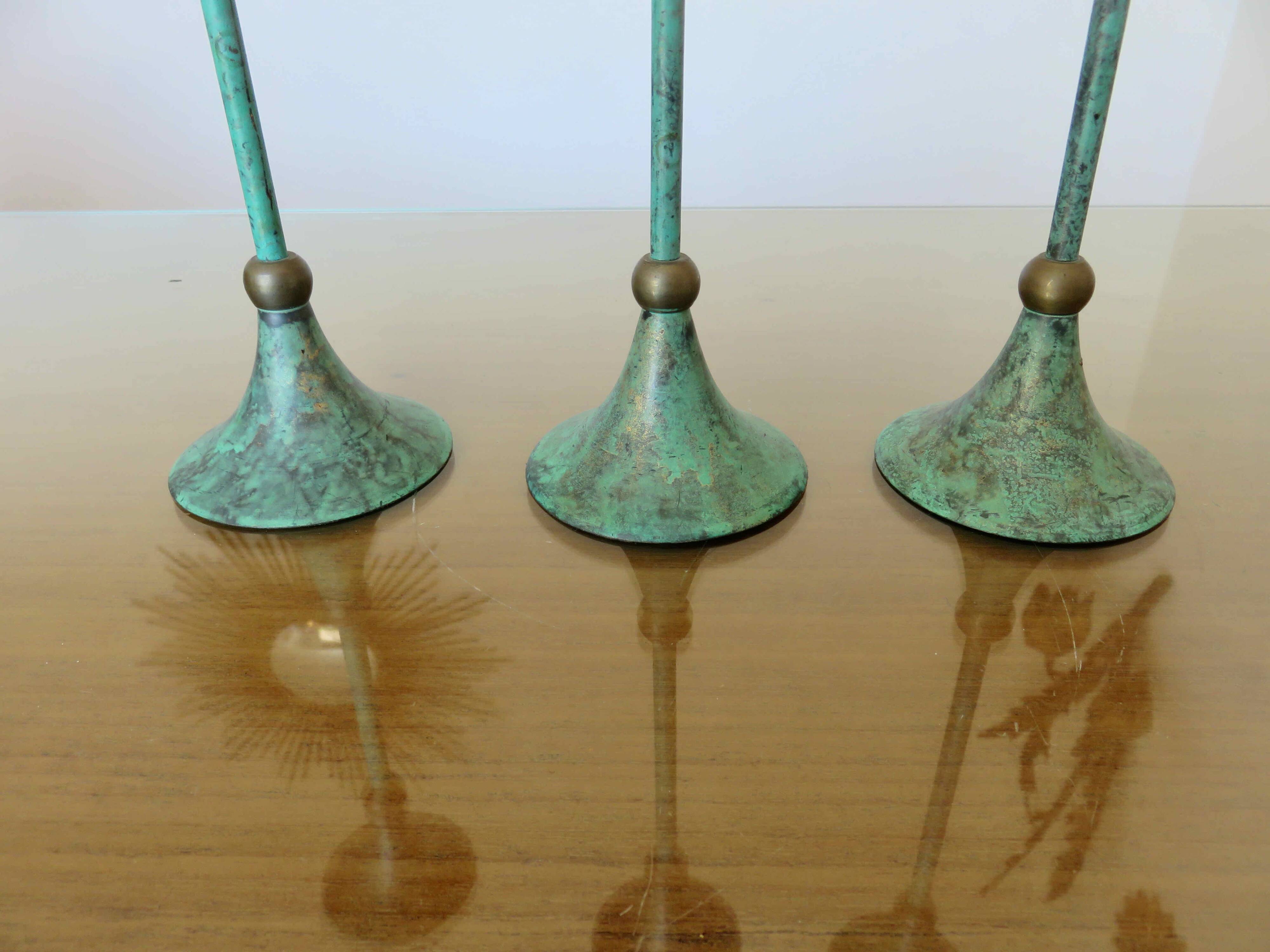 Series of 3 green tinted brass candlesticks from the 70s