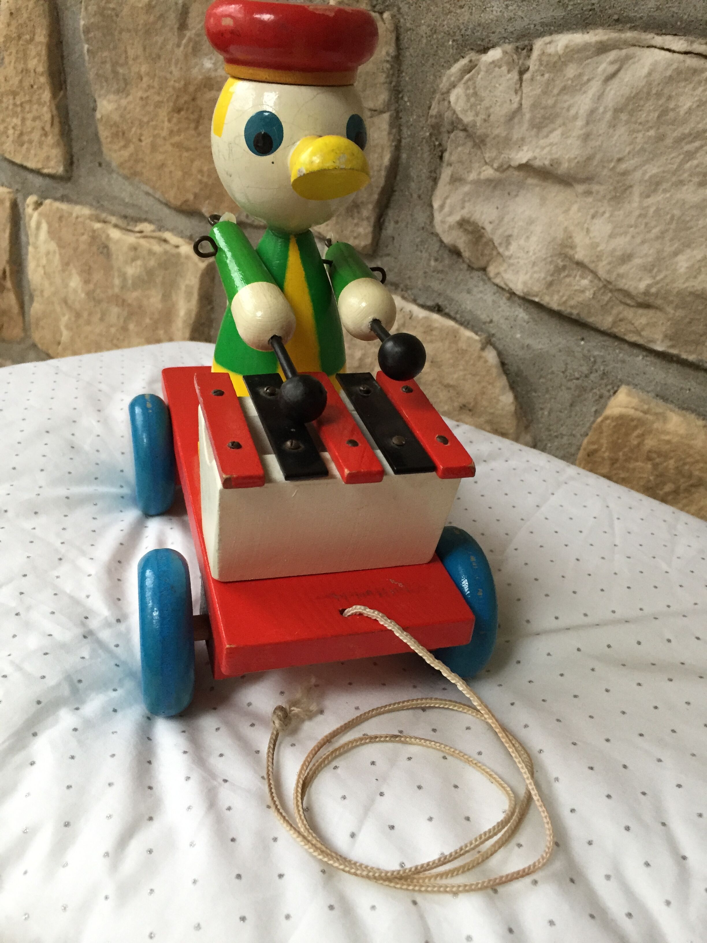 Old toy to shoot, duck and xylophone