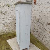 Old patinated bonnet maker