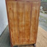 Vintage wooden buffet with a marble top.
