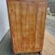 Vintage wooden buffet with a marble top.