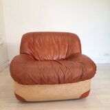 Four vintage armchairs, leather and fabric, 70s