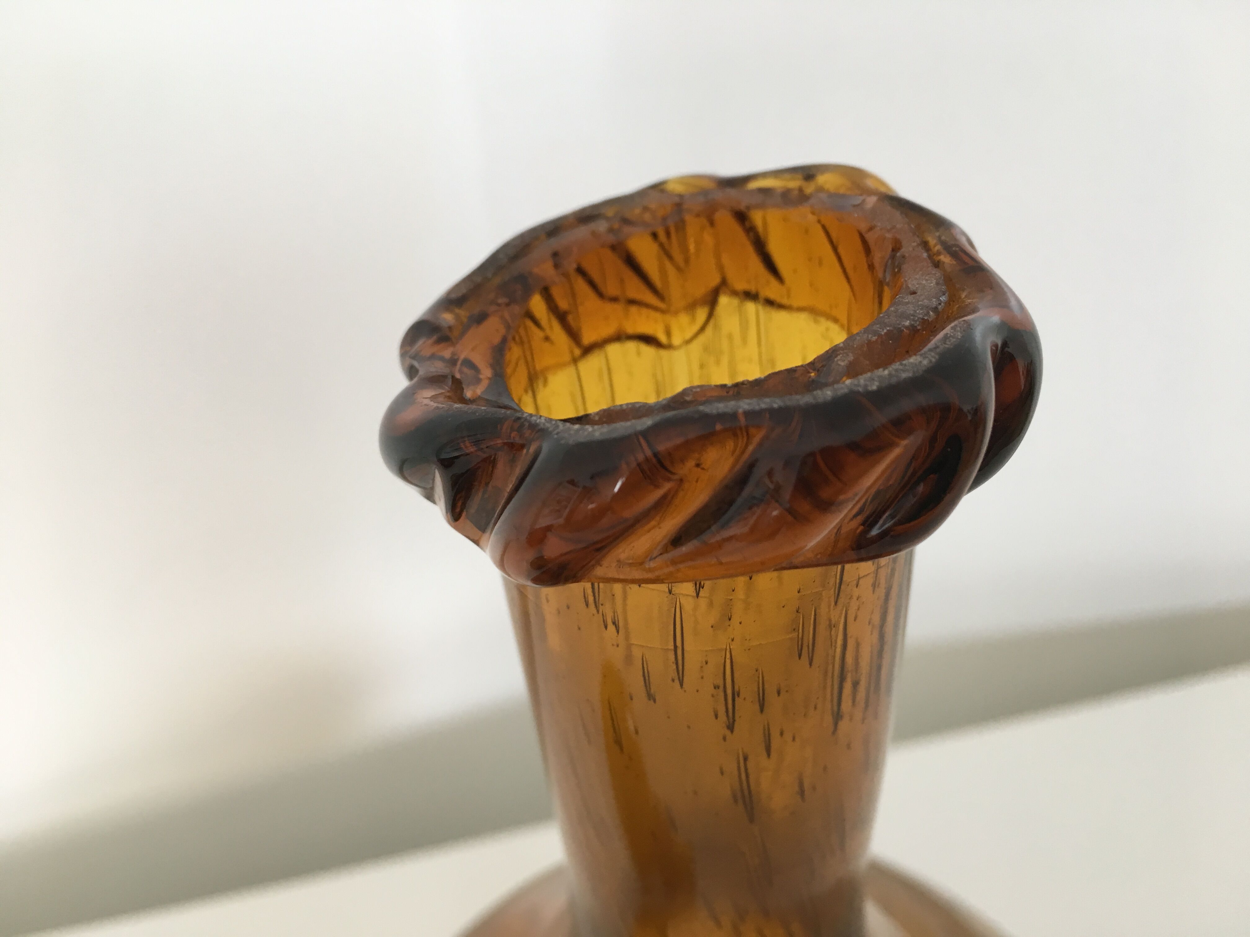 Biot blown glass amber bottle