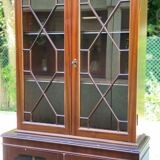 English display case with 2 wooden bodies