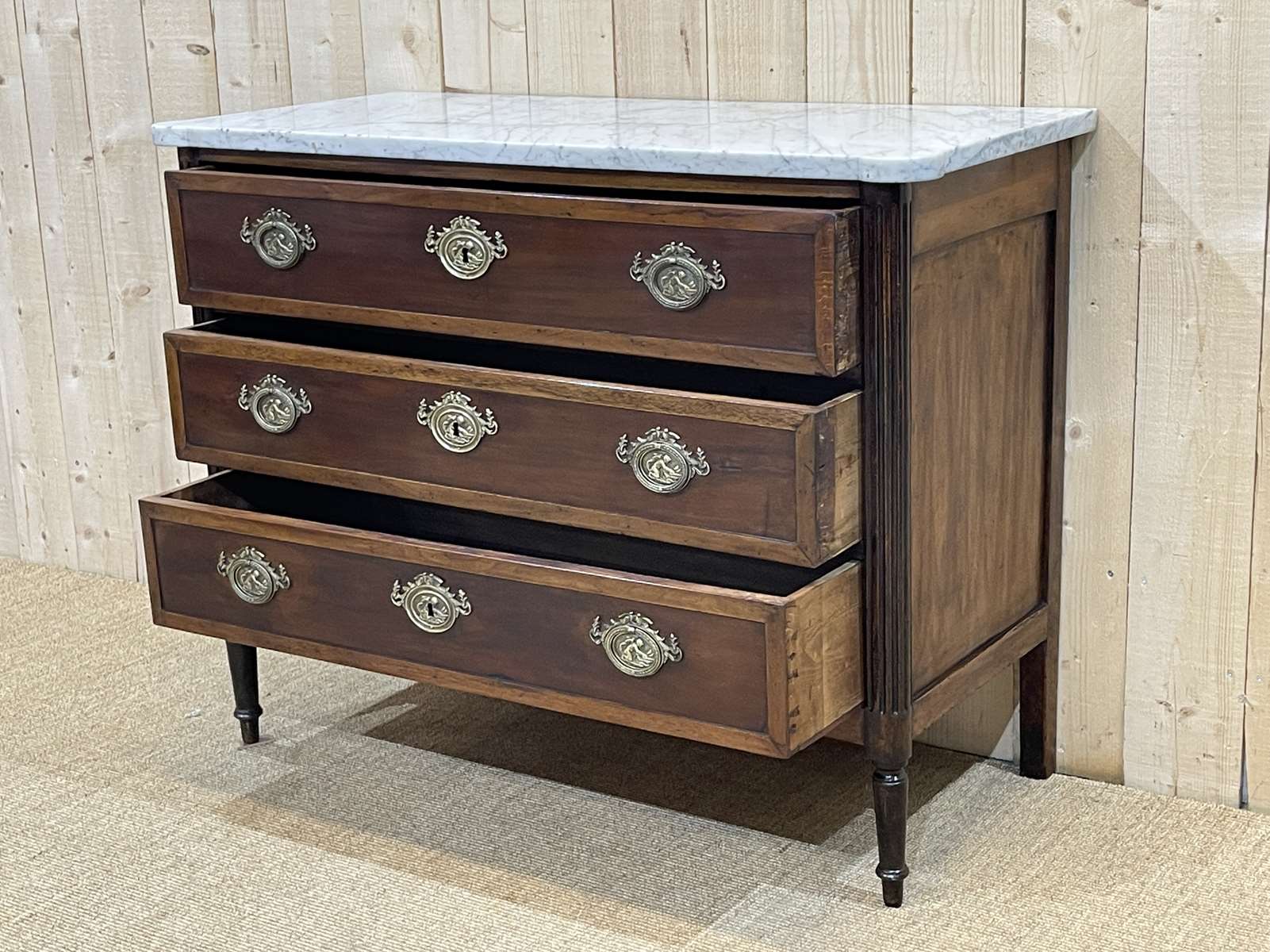 Louis XVI XIXth chest of drawers in mahogany and walnut and white marble top