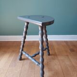 Bluish-grey tripod stool