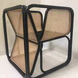 Armchair in black lacquered rattan and natural cane