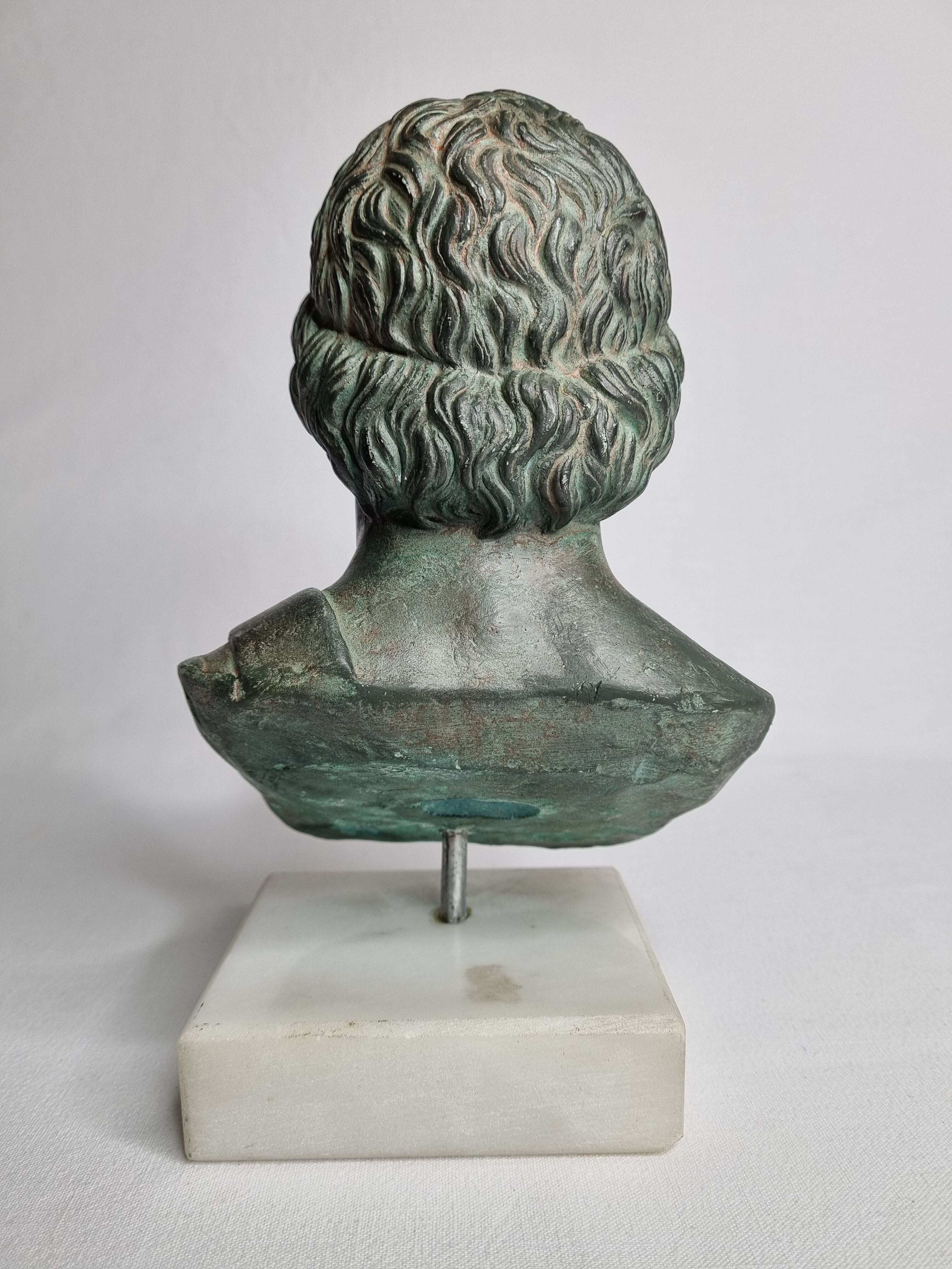 Bust of Esculape in patinated plaster on marble base, 21 cm