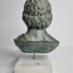 Bust of Esculape in patinated plaster on marble base, 21 cm