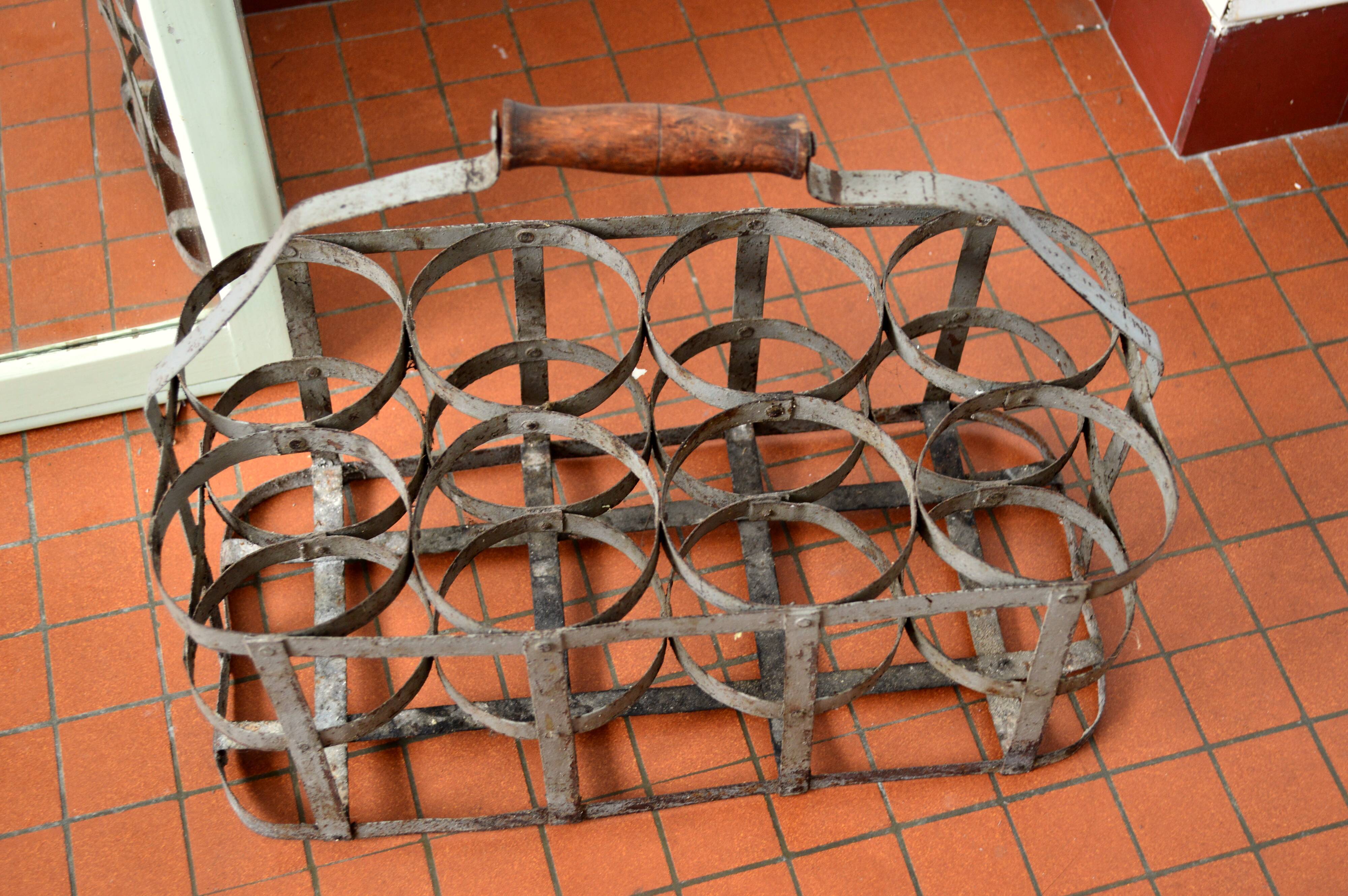 Old metal bottle holder