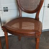Pair of Louis XVI caned medallion chairs