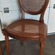 Paire de chaises médaillon Louis XVI cannées