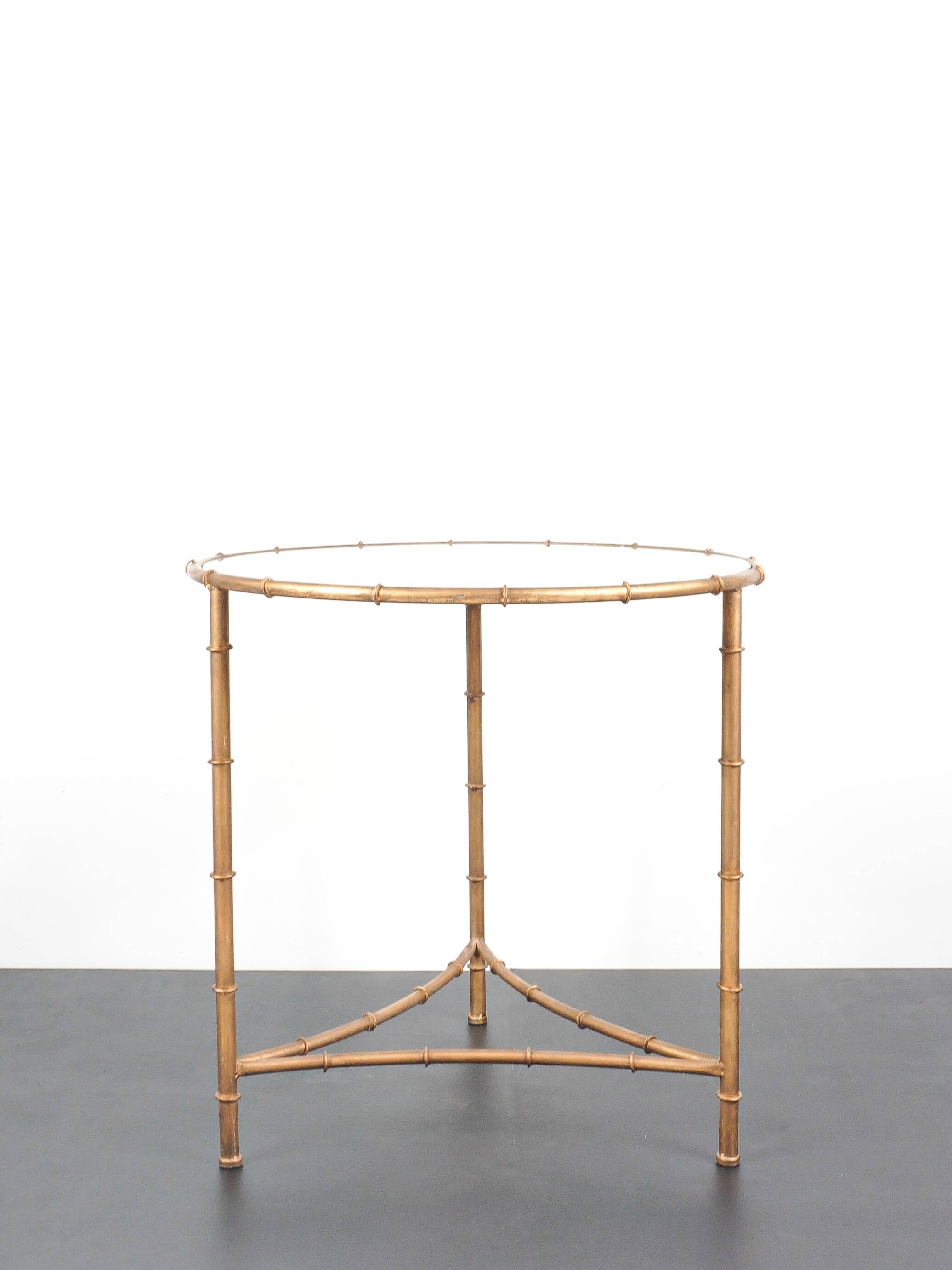 Vintage table / side table in gold metal with a mirrored top.