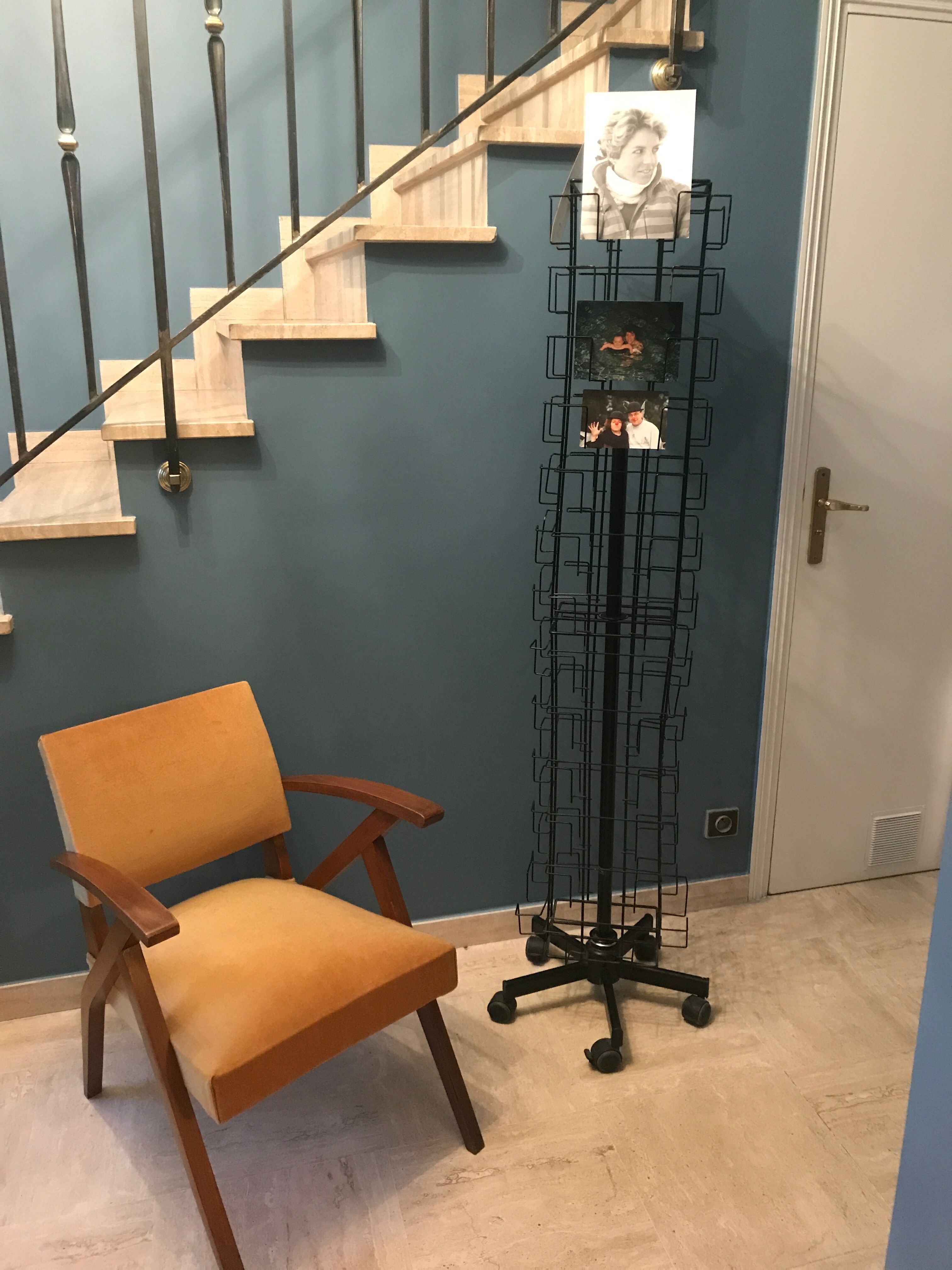 Display postcards and photos in black metal turnstile