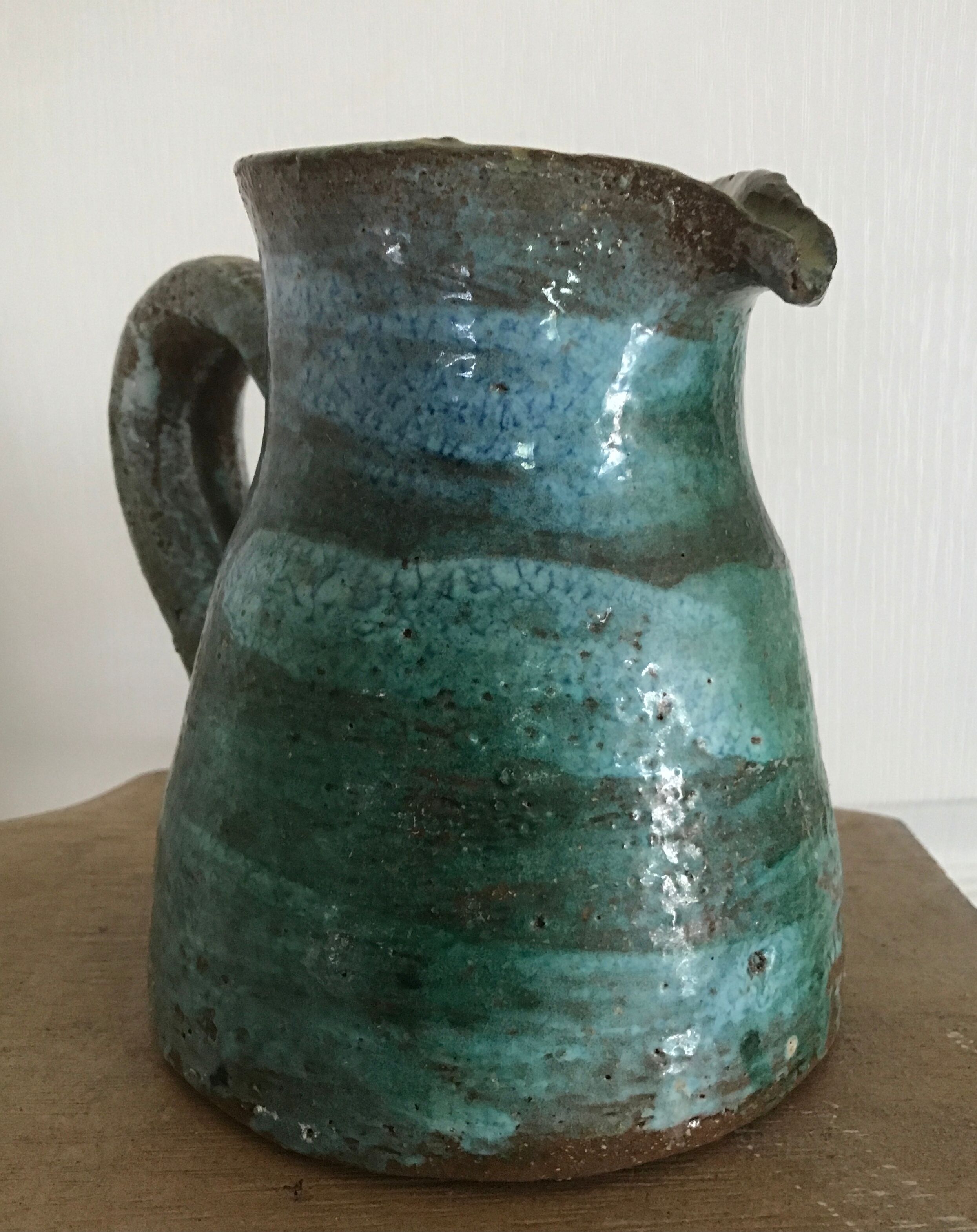 Vintage broc pitcher in enamelled sandstone with effect of blue shades, turquoise green signed