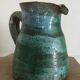 Vintage broc pitcher in enamelled sandstone with effect of blue shades, turquoise green signed