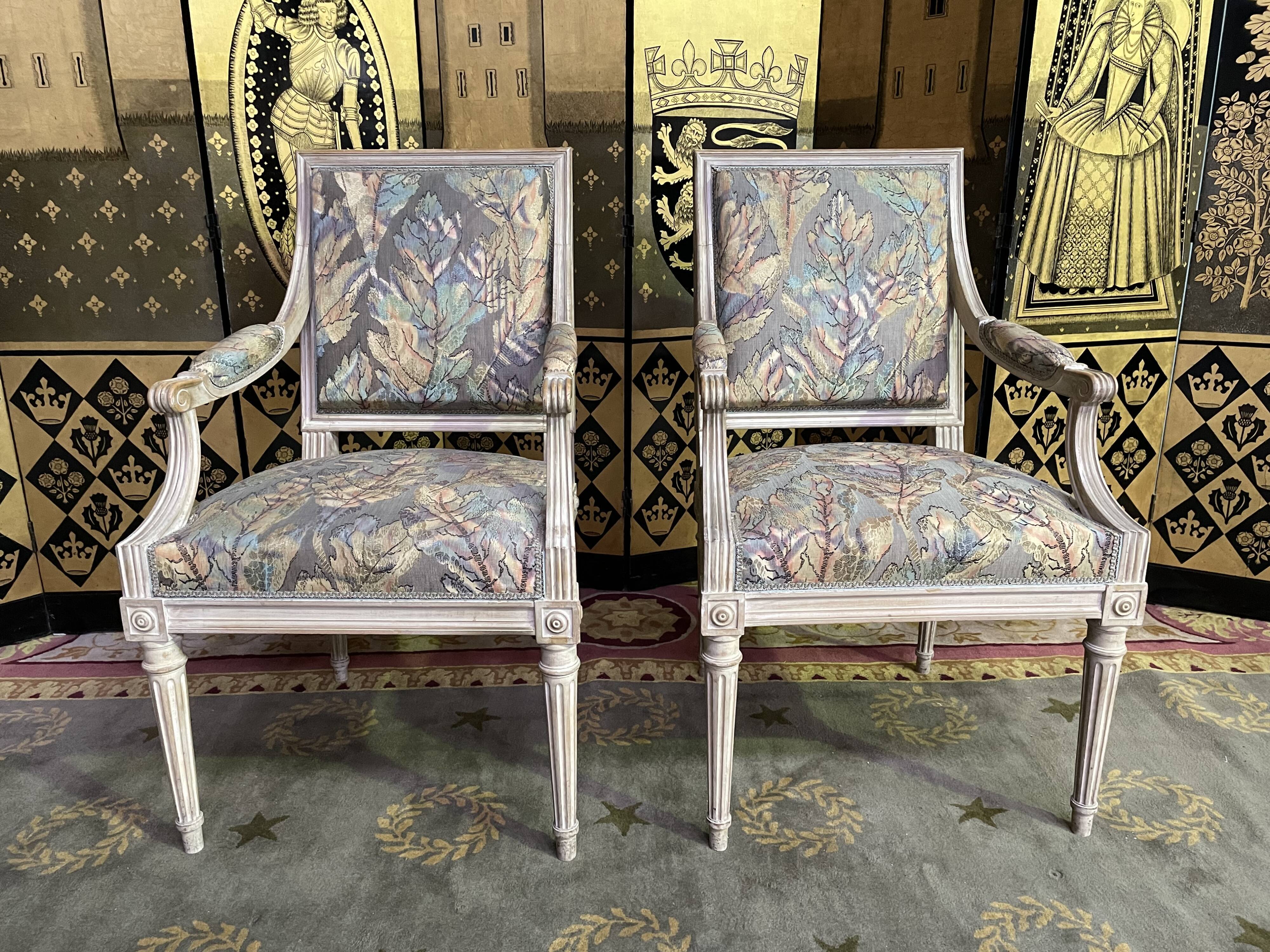 Pair of Louis XVI style convertible armchairs
