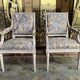 Paire de fauteuils cabriolets de style Louis XVI