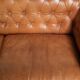 Sheepskin 2.5-seater Chesterfield sofa in a light cognac colour