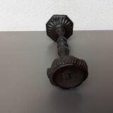 Old cast iron candle holder