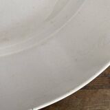 Set of large round white earthenware dishes from Creil and Montereau, 19th century